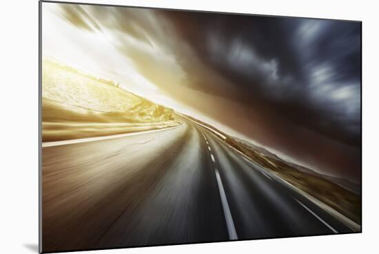 Asphalt Road in Field Against Moody Clouds at Sunset, Tuscany, Italy-null-Mounted Photographic Print