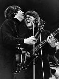 Paul Mccartney and George Harrison Tune their Guitars-Associated Newspapers-Photo