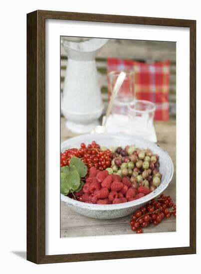 Assorted Berries in Bowl on Garden Table-Eising Studio - Food Photo and Video-Framed Photographic Print