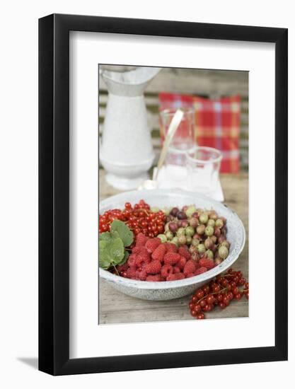 Assorted Berries in Bowl on Garden Table-Eising Studio - Food Photo and Video-Framed Photographic Print