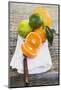 Assorted Citrus Fruit on White Cloth-Foodcollection-Mounted Photographic Print