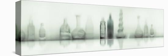 Assorted Glassware on a White Background-null-Stretched Canvas