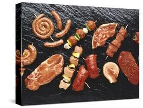Assorted Meats and Sausages on Hot Stone Grill-Stefan Oberschelp-Stretched Canvas