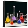 Assortment of Laboratory Flasks Holding Solutions-Tek Image-Framed Stretched Canvas