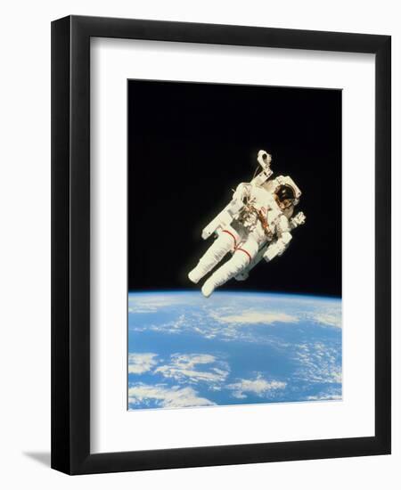 Astronaut Bruce McCandless Walking In Space-null-Framed Premium Photographic Print