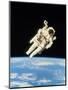 Astronaut Bruce McCandless Walking In Space-null-Mounted Premium Photographic Print