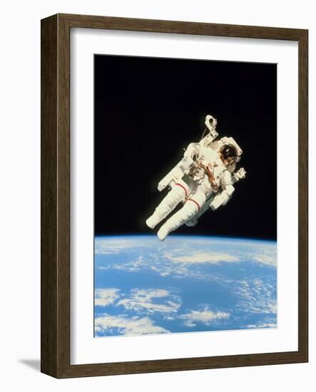 Astronaut Bruce McCandless Walking In Space-null-Framed Photographic Print