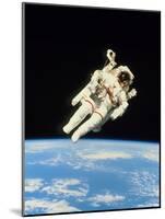 Astronaut Bruce McCandless Walking In Space-null-Mounted Photographic Print