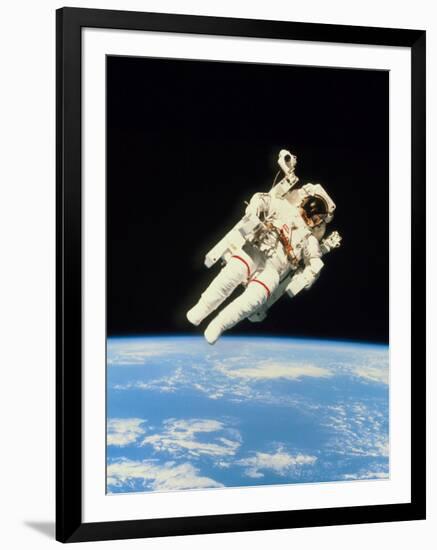 Astronaut Bruce McCandless Walking In Space-null-Framed Photographic Print