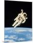 Astronaut Bruce McCandless Walking In Space-null-Mounted Photographic Print