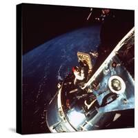 Astronaut Dave Scott Gazing from Hatch of Apollo 9 Command Module Toward Untested Lunar Module-null-Stretched Canvas