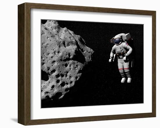 Astronaut Exploring an Asteroid in Outer Space-null-Framed Art Print
