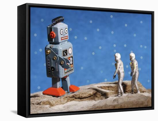 Astronaut Figurines Meeting Space Robot-null-Framed Stretched Canvas