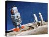 Astronaut Figurines Standing Beside Gray Toy Rocket-null-Stretched Canvas