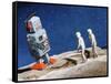 Astronaut Figurines Standing Beside Gray Toy Rocket-null-Framed Stretched Canvas