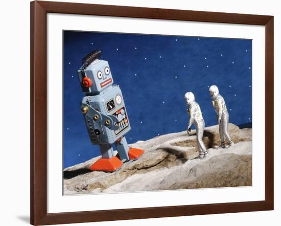 Astronaut Figurines Standing Beside Gray Toy Rocket-null-Framed Photographic Print