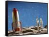 Astronaut Figurines Standing Beside Toy Rocket-null-Framed Stretched Canvas