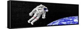 Astronaut Floating in Outer Space Above Planet Earth-null-Framed Stretched Canvas