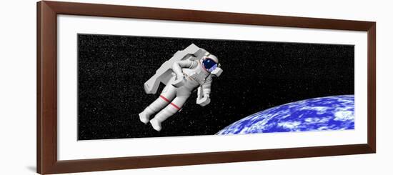 Astronaut Floating in Outer Space Above Planet Earth-null-Framed Art Print