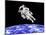 Astronaut Floating in Outer Space Above Planet Earth-null-Mounted Art Print