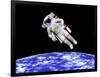 Astronaut Floating in Outer Space Above Planet Earth-null-Framed Art Print