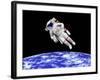 Astronaut Floating in Outer Space Above Planet Earth-null-Framed Art Print