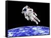 Astronaut Floating in Outer Space Above Planet Earth-null-Framed Stretched Canvas