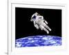 Astronaut Floating in Outer Space Above Planet Earth-null-Framed Art Print