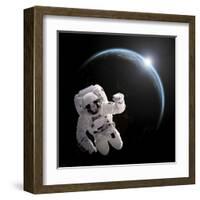 Astronaut Floating in Space as the Sun Rises on an Earth-Like Planet-Stocktrek Images-Framed Art Print