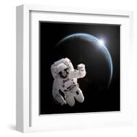 Astronaut Floating in Space as the Sun Rises on an Earth-Like Planet-Stocktrek Images-Framed Art Print