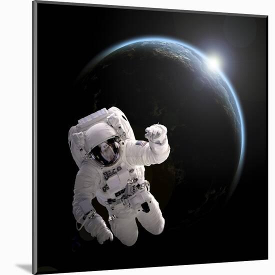 Astronaut Floating in Space as the Sun Rises on an Earth-Like Planet-Stocktrek Images-Mounted Art Print