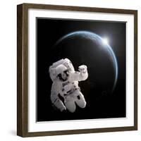 Astronaut Floating in Space as the Sun Rises on an Earth-Like Planet-Stocktrek Images-Framed Art Print