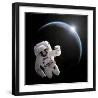 Astronaut Floating in Space as the Sun Rises on an Earth-Like Planet-Stocktrek Images-Framed Art Print