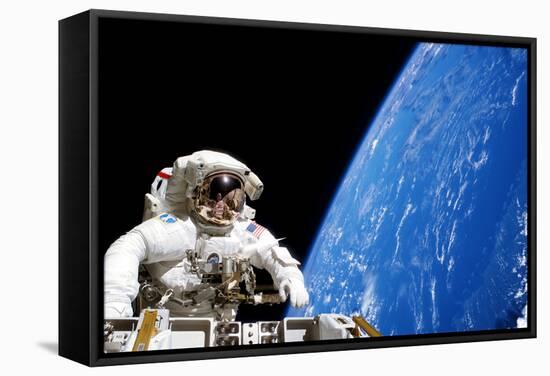 Astronaut Performing a Spacewalk-null-Framed Stretched Canvas