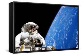 Astronaut Performing a Spacewalk-null-Framed Stretched Canvas