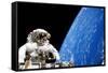 Astronaut Performing a Spacewalk-null-Framed Stretched Canvas