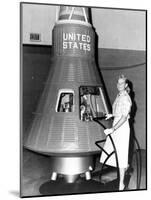 Astronaut Trainees Jerrie Cobb Stands Next to a Mercury Spaceship Capsule-null-Mounted Photo