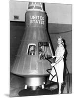 Astronaut Trainees Jerrie Cobb Stands Next to a Mercury Spaceship Capsule-null-Mounted Photo
