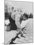 Astronaut Virgil I. Grissom Using Roof Cement at Home-Ralph Morse-Mounted Premium Photographic Print