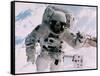 Astronaut Walking in Space-David Bases-Framed Stretched Canvas