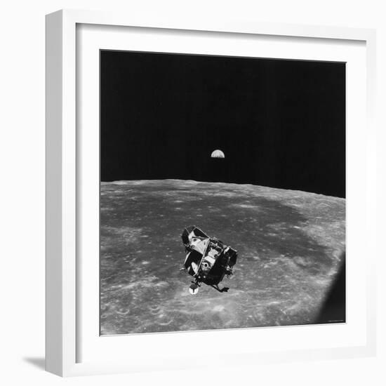 Astronauts in Apollo 11 Spacecraft, on Return Trip to Earth After Collecting Souvenirs-null-Framed Photographic Print