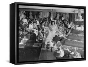At Palumbo's Cafe, Bride Mrs. Salvatore Cannella Walks Onto Stage, Facing a Revolving Cake Display-Cornell Capa-Framed Stretched Canvas