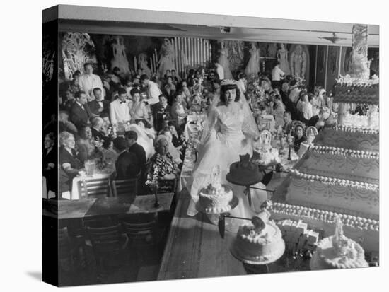 At Palumbo's Cafe, Bride Mrs. Salvatore Cannella Walks Onto Stage, Facing a Revolving Cake Display-Cornell Capa-Stretched Canvas