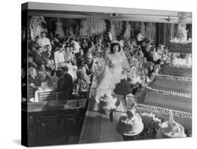 At Palumbo's Cafe, Bride Mrs. Salvatore Cannella Walks Onto Stage, Facing a Revolving Cake Display-Cornell Capa-Stretched Canvas