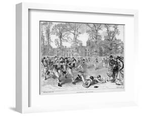 At Rugby School a Crowd of Schoolboys Run after the Ball at Rugby-Walter Thomas-Framed Photographic Print