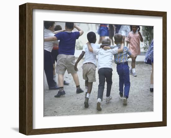 At the Desegregated Lusher School Three Boys Display Camaraderie Walking Through Playground-Bill Eppridge-Framed Photographic Print