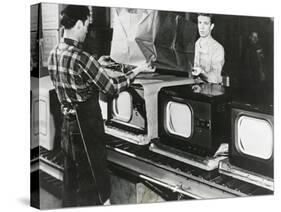 At the End of the Assembly Line, Inspected Televisions are Packaged in an American Factory-null-Stretched Canvas