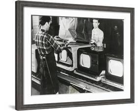 At the End of the Assembly Line, Inspected Televisions are Packaged in an American Factory-null-Framed Photo