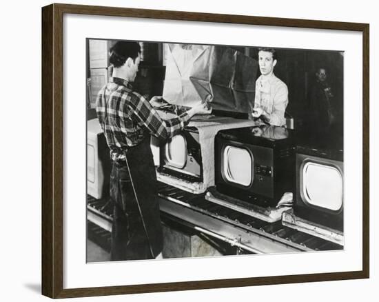 At the End of the Assembly Line, Inspected Televisions are Packaged in an American Factory-null-Framed Photo