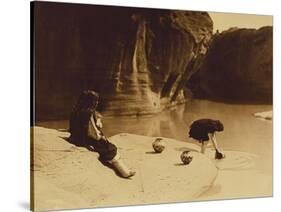 At the Old Well at Acoma-Edward S. Curtis-Stretched Canvas